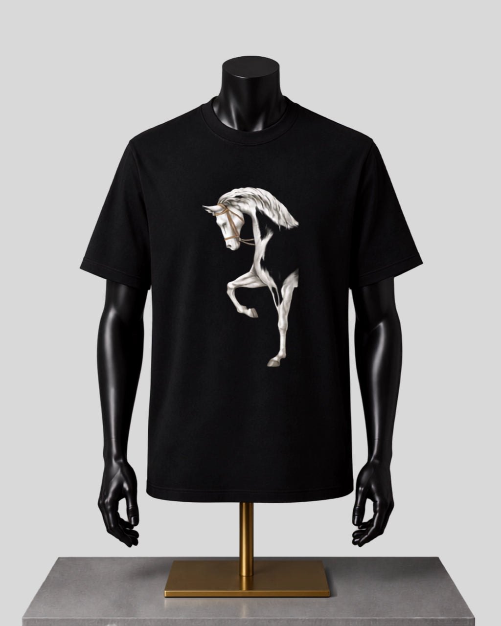 A black short-sleeve crewneck t-shirt displayed on a black mannequin torso with a gold stand, featuring a graphic print of a white skeletal horse on the chest, set against a solid gray background.