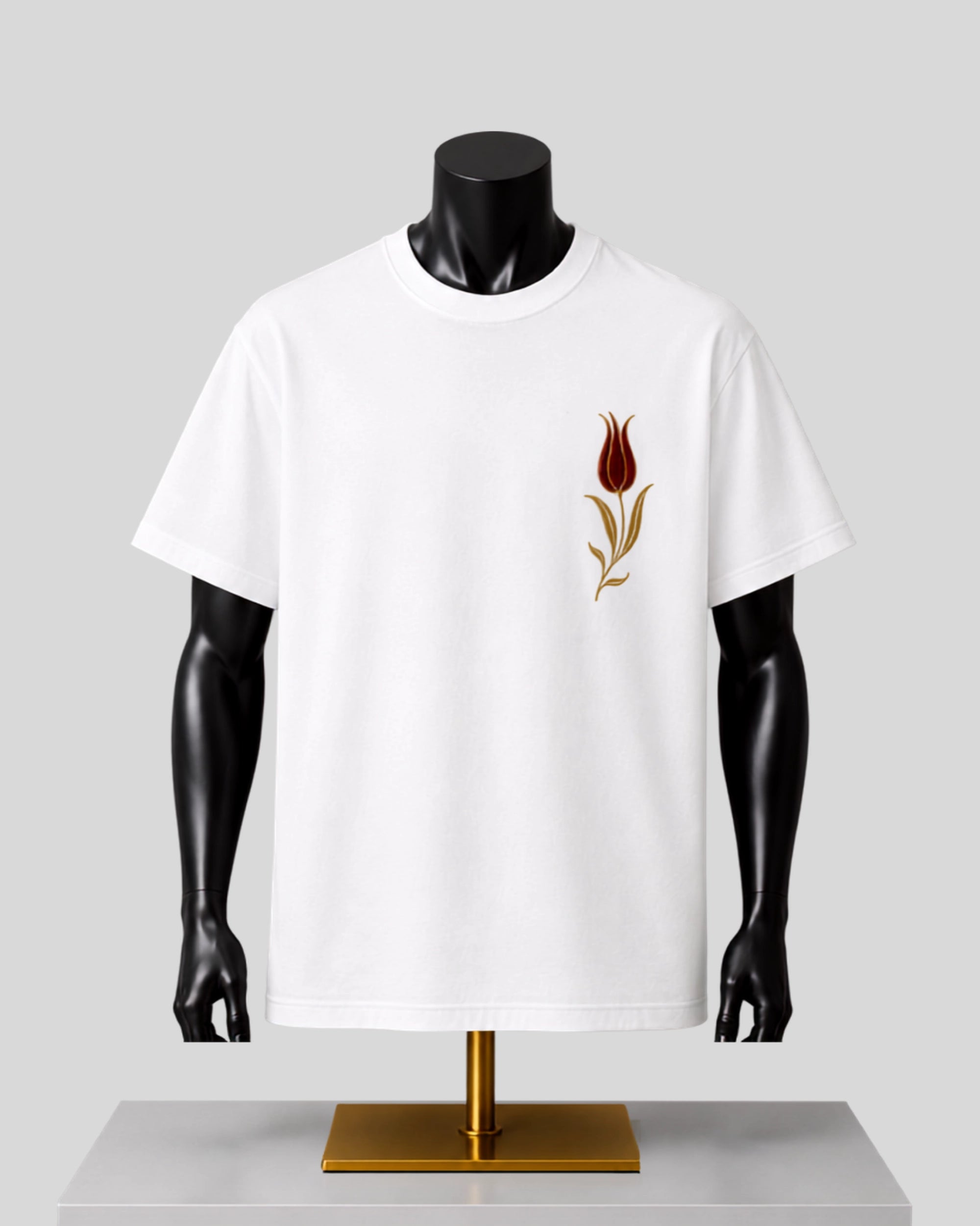 White premium cotton T-shirt featuring a crimson tulip-inspired heritage back graphic.