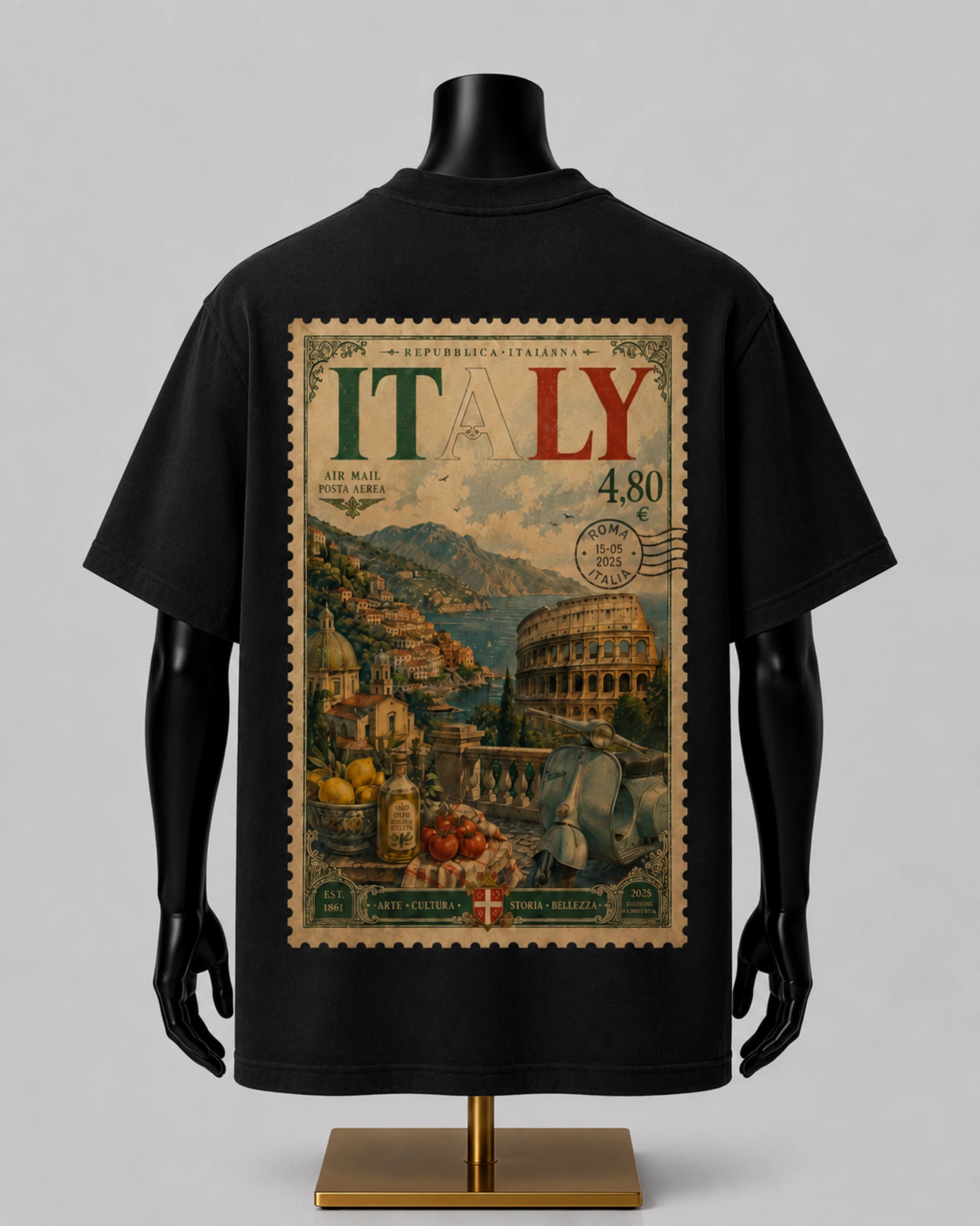 A black short-sleeve T-shirt displayed on a black mannequin torso with a gold stand, shown from the back. The shirt features a large rectangular vintage-style Italy travel-postmark graphic with the word ITALY, scenic artwork including the Colosseum and Mount Vesuvius, and postmark details on a light gray background.