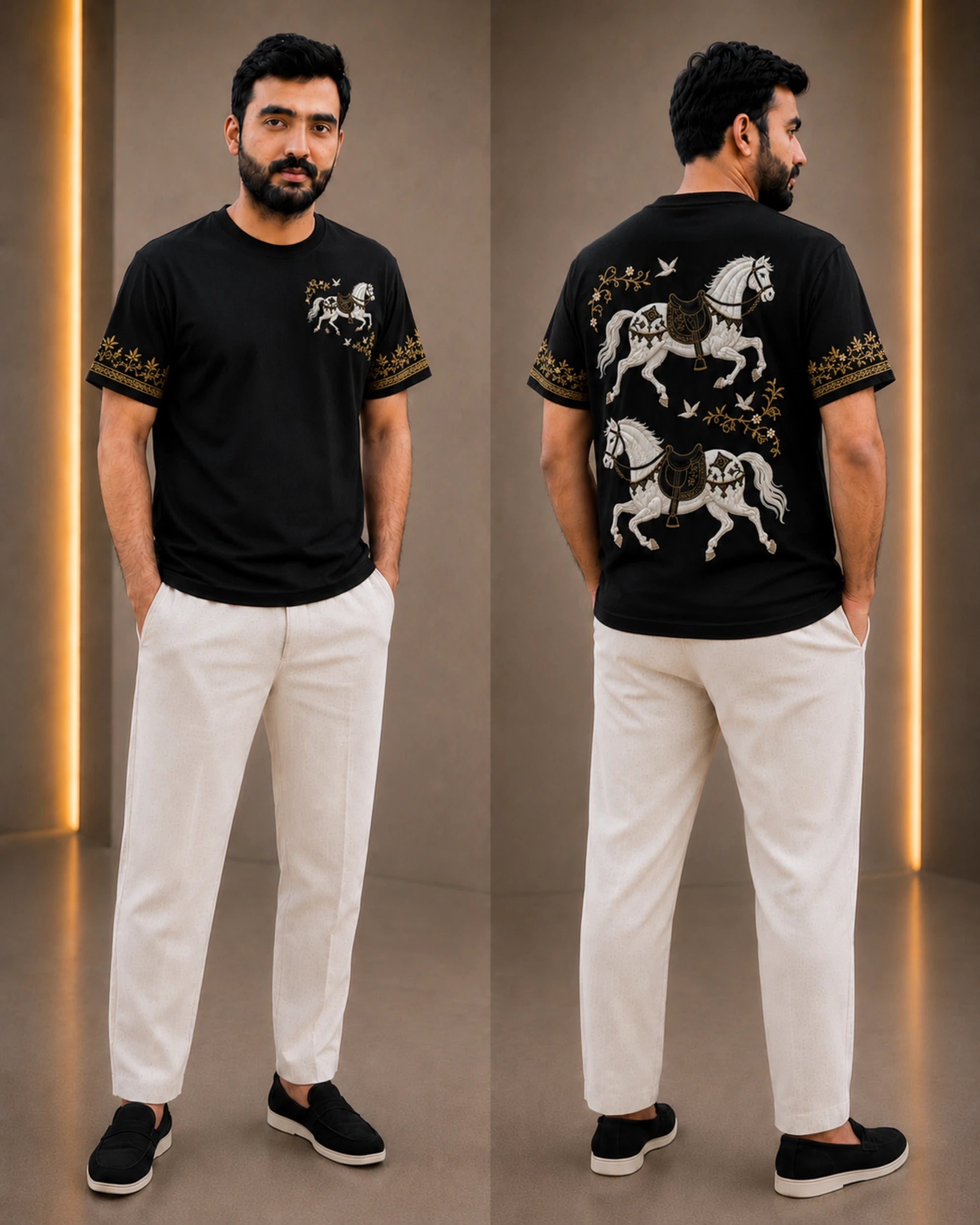 A man is shown from the front and back wearing a black short-sleeve t-shirt with white horse graphics and gold sleeve embroidery, paired with off-white trousers and black slip-on shoes, set against a modern indoor studio backdrop with warm vertical light strips.